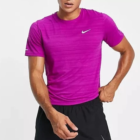 Pink and purple nike shirt on sale