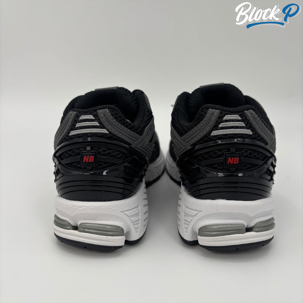 New Balance 1906R Black/Red top-down view — Block P Liverpool