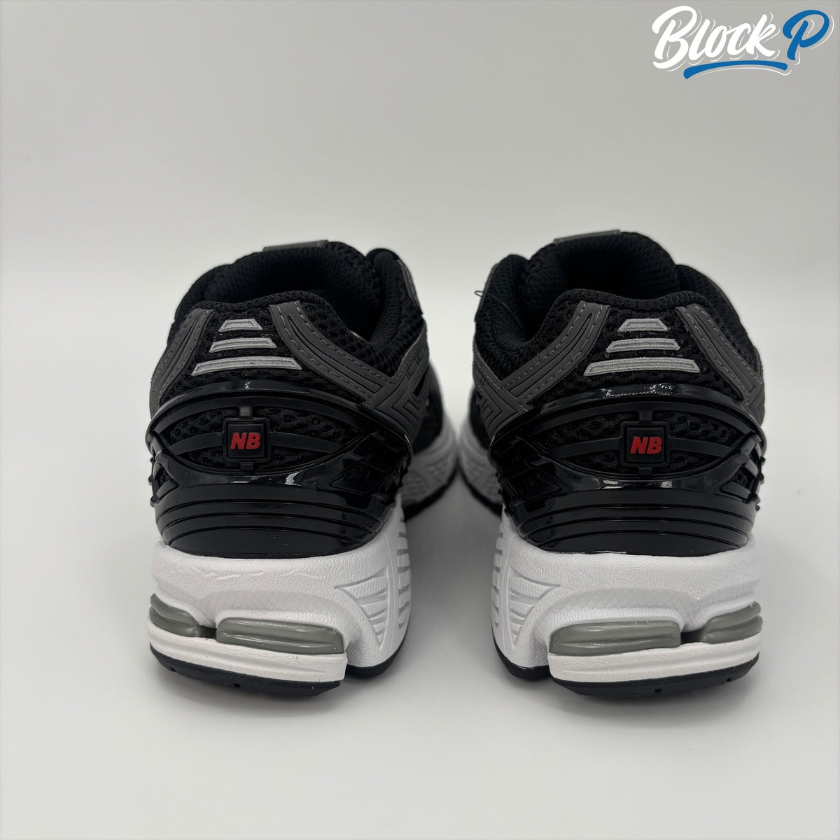 New Balance 1906R Black/Red top-down view — Block P Liverpool