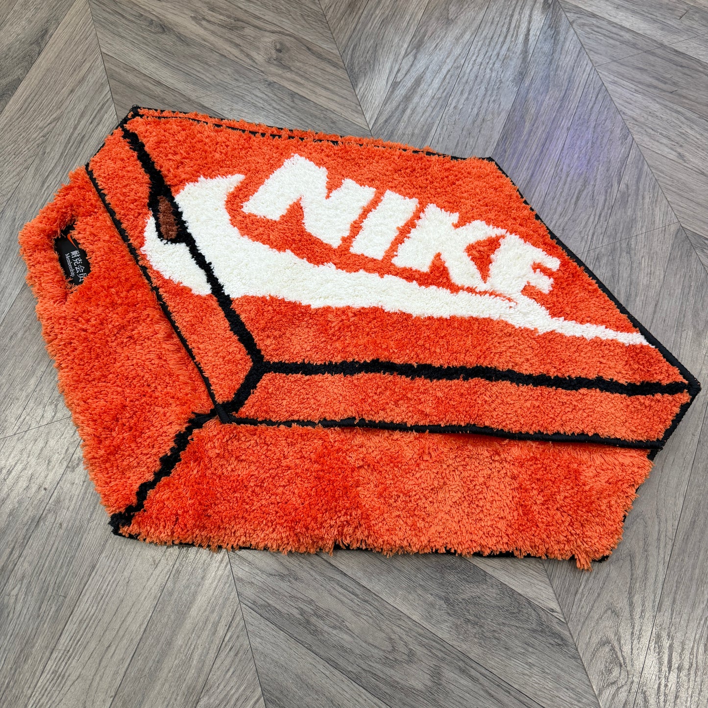 Alfombra exclusiva de Nike Asia