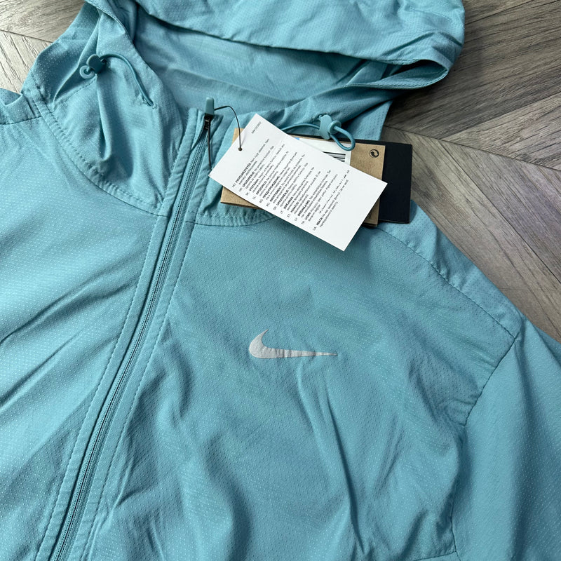 Nike teal windbreaker hot sale