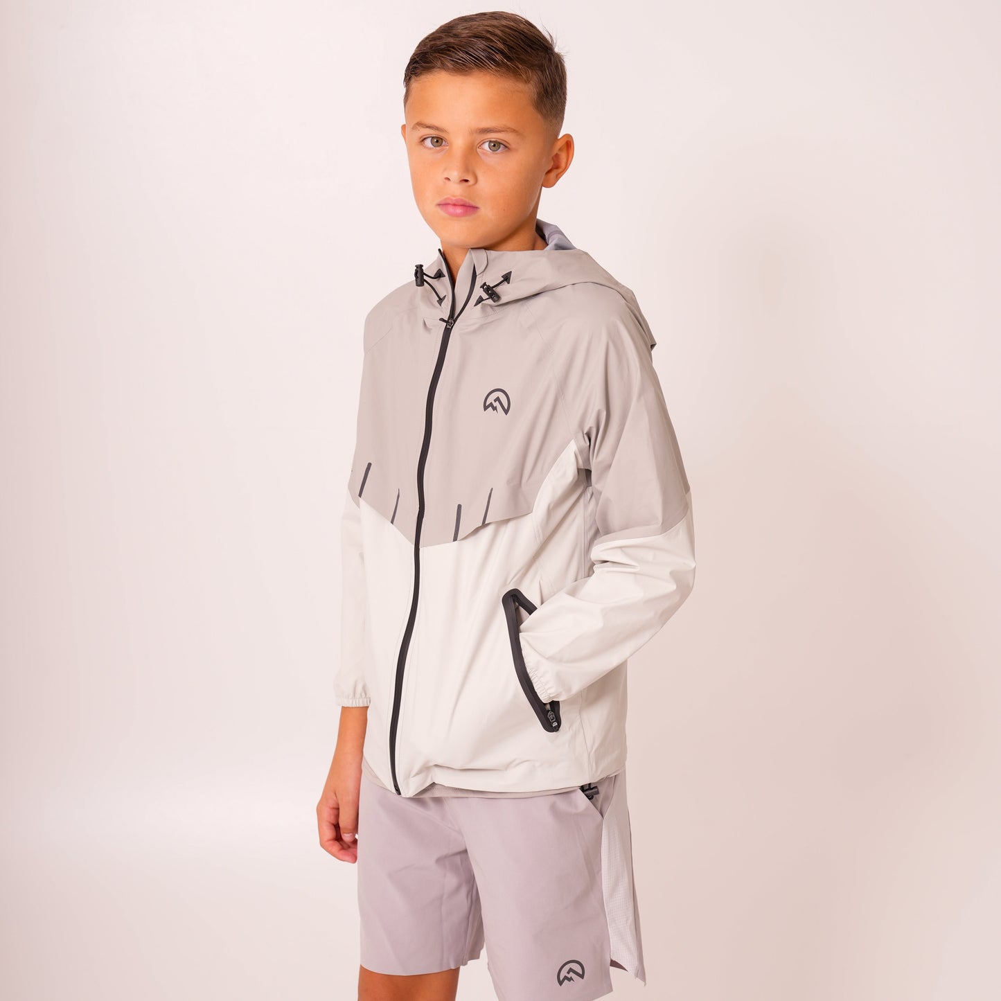 SS26 Junior Waterproof Madge Jacket - Light Grey/Concrete/Silver