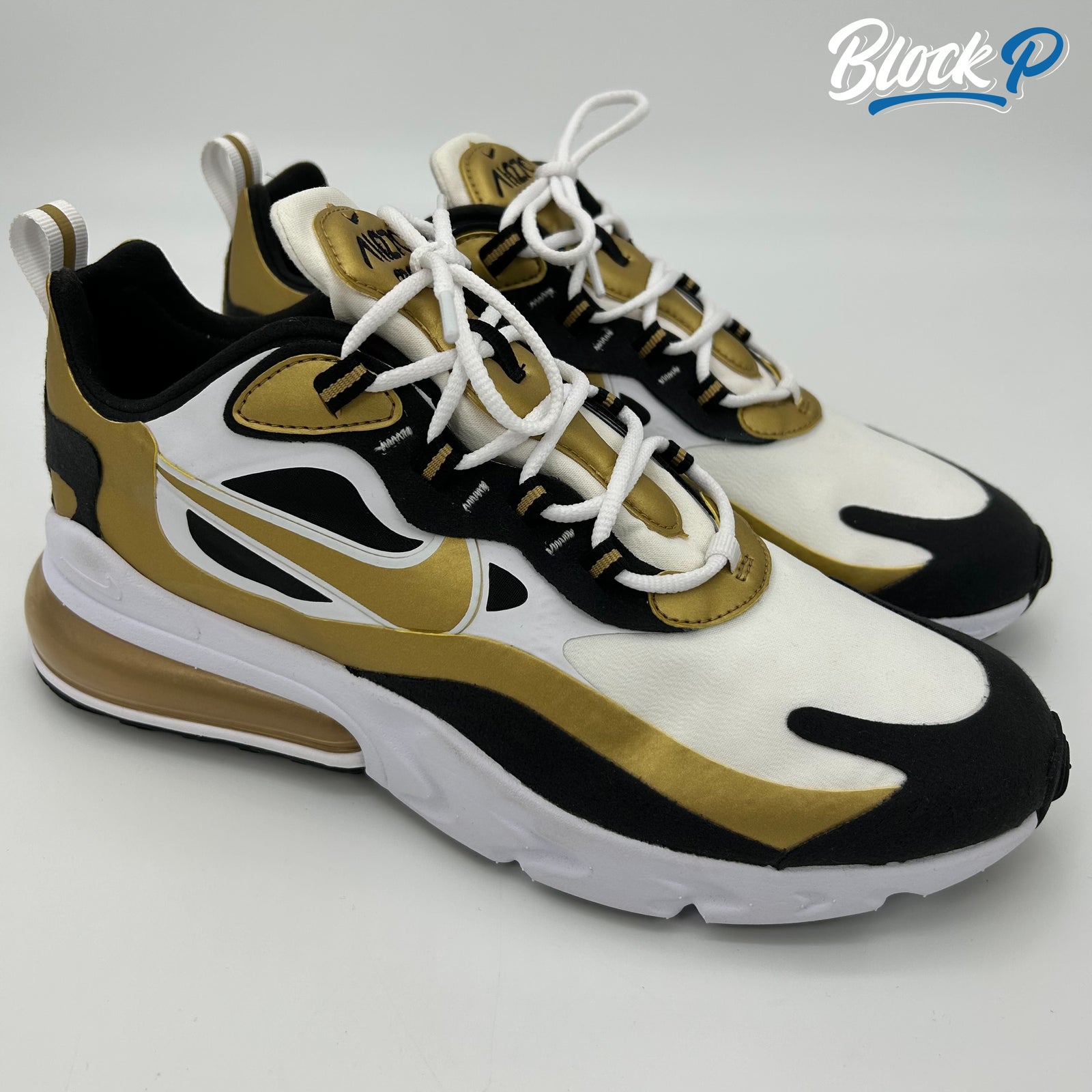 Black and gold nike 270 best sale