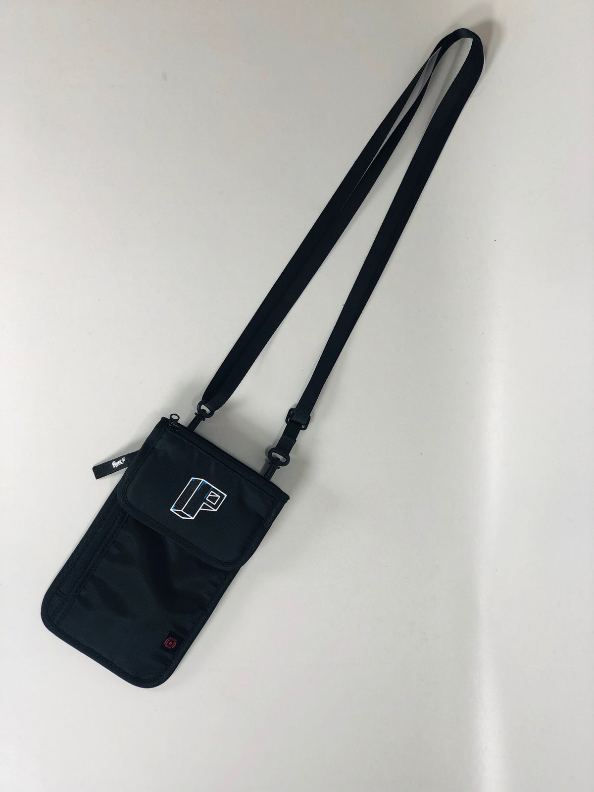 Block P Neck Pouch in black, front view — available at Block P Liverpool