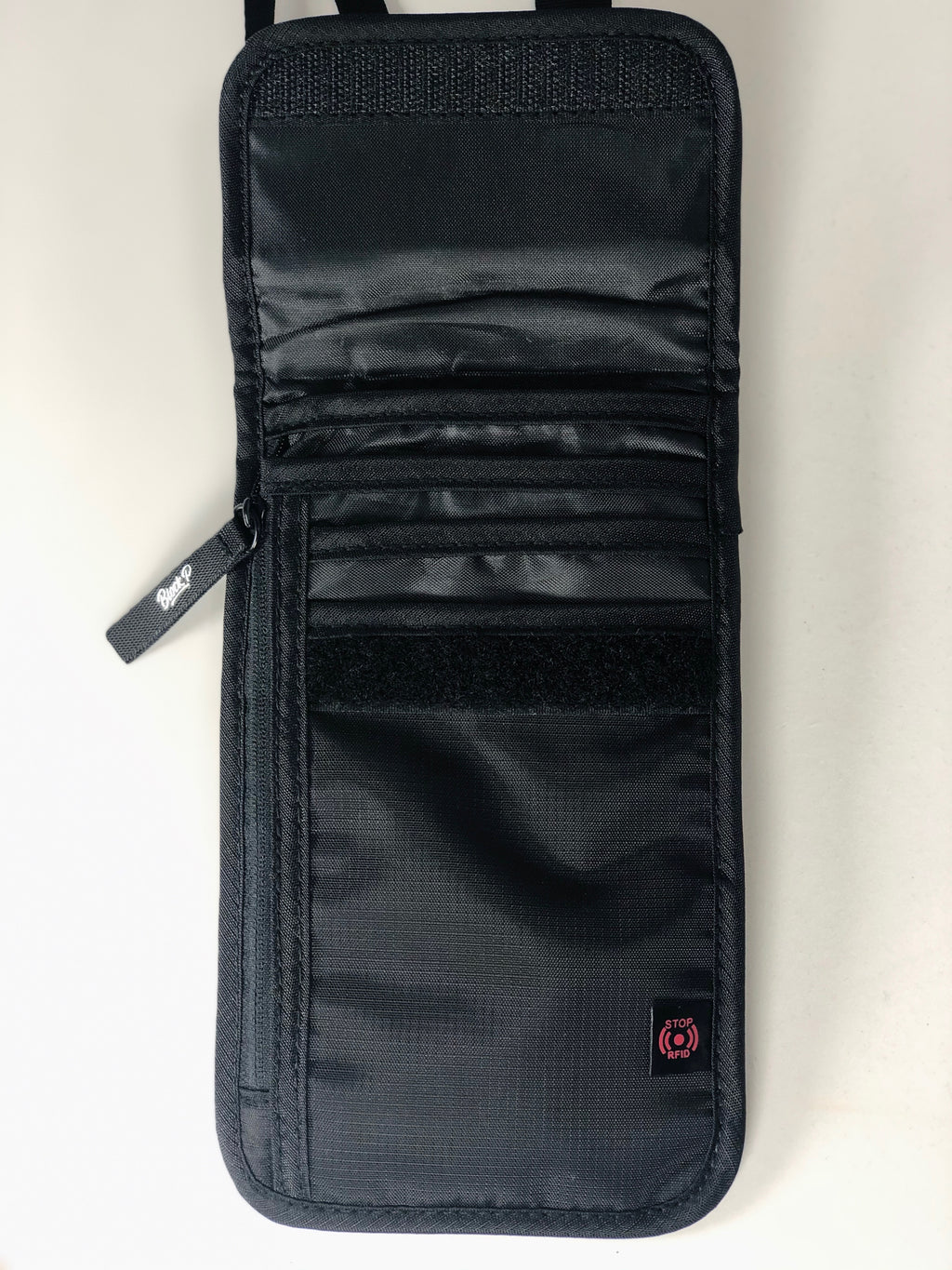 Block P Neck Pouch detail view — zip closure and multiple pockets