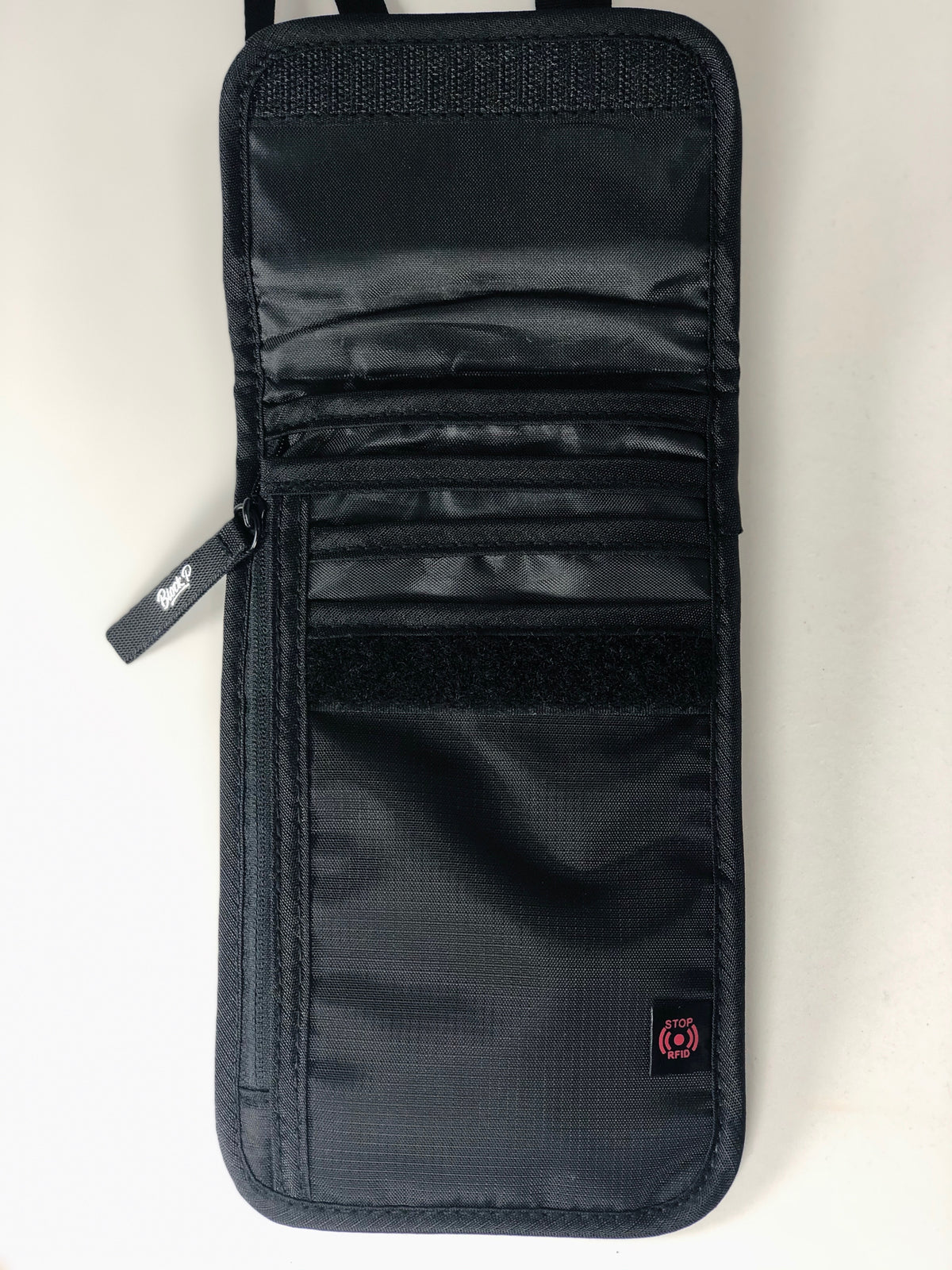 Block P Neck Pouch detail view — zip closure and multiple pockets